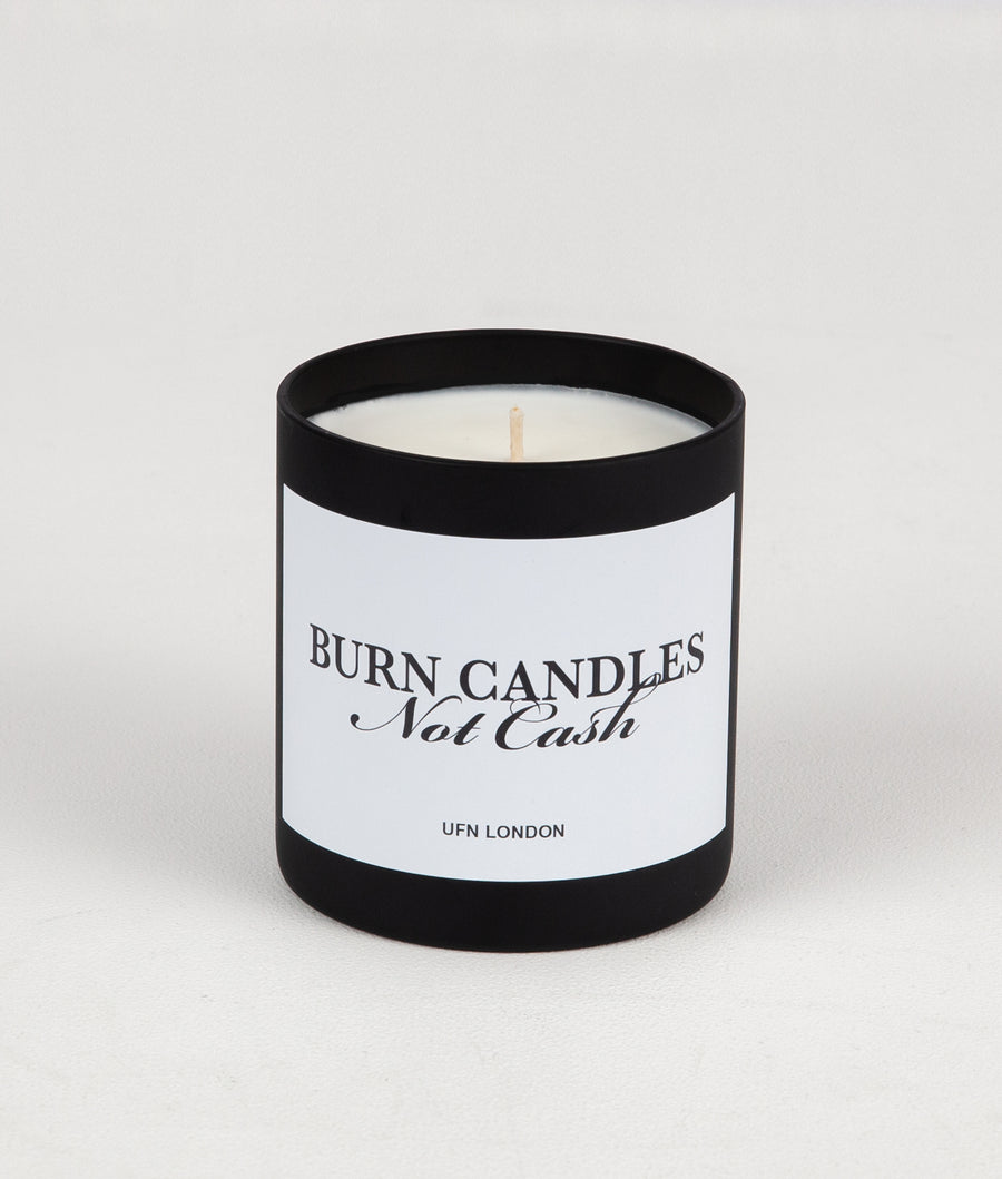 "BURN CANDLES NOT CASH" CANDLE